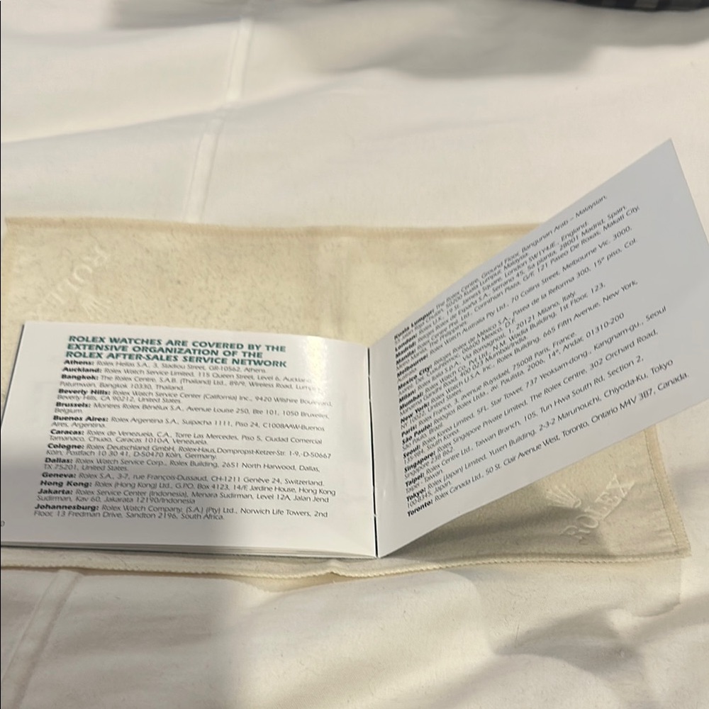 ROLEX FACTORY SERVICE CARE BOOK AND ROLEX CLEANING CLOTH - Picture 2 of 8